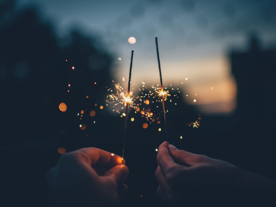 Two sparklers signifying new year's celebration
